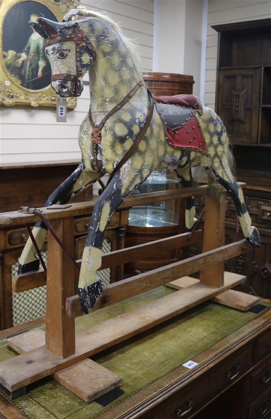 An early 20th century dappled grey rocking horse, by Collinson H.100cm